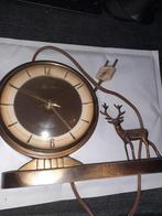 Vintage Hesma Wandklok met Hert Ornament, Ophalen of Verzenden