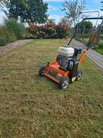 Verticuteren en bemesten van uw gazon., Tuin en Terras, Verticuteermachines, Ophalen, Nieuw, Benzine, Eliet