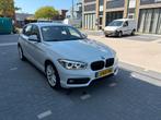 BMW 1-Serie 118i 136pk Aut 2017 Wit, Auto's, 65 €/maand, 1295 kg, Wit, 650 kg
