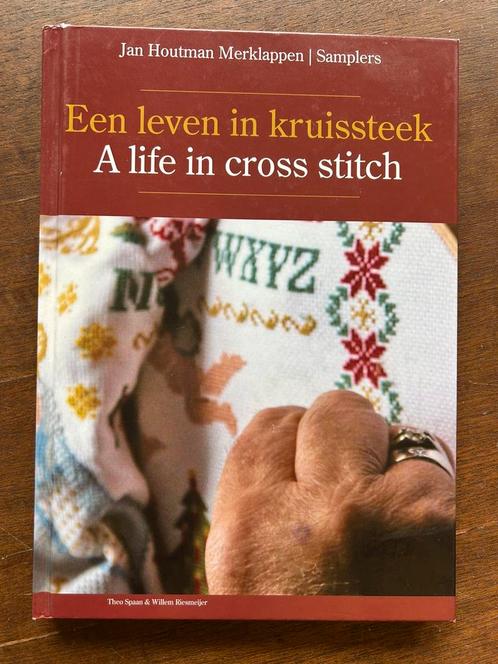 Jan Houtman Merklappen - Een leven in kruissteek, Boeken, Hobby en Vrije tijd, Zo goed als nieuw, Ophalen of Verzenden