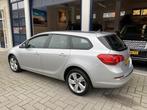 Opel Astra Sports Tourer 1.4 Cosmo NAVI/CLIMA/CRUISE, Origineel Nederlands, Te koop, Zilver of Grijs, 5 stoelen