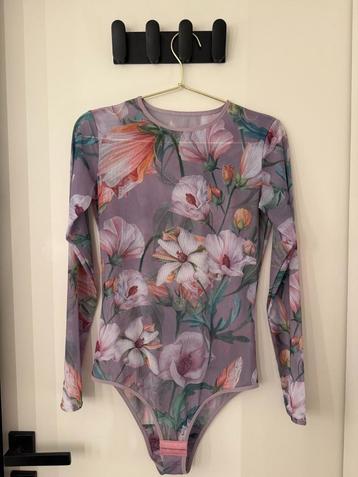 Fiocci bodysuit, size M beschikbaar voor biedingen