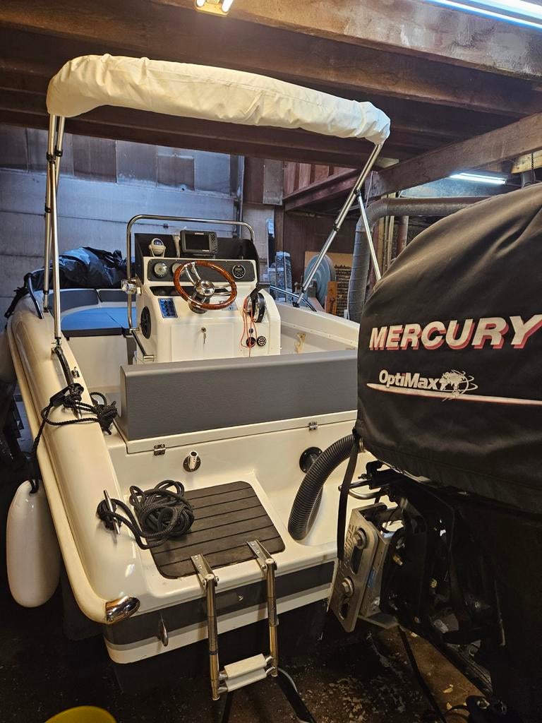 Mooie arkos consoleboot 150pk mercury optimax riba trailer, Watersport en Boten, Vis- en Consoleboten, 70 pk of meer, 3 tot 6 meter