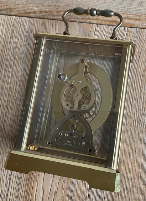 De klok is een vintage KUNDO skeleton carriage clock, Antiek en Kunst, Antiek | Klokken, Ophalen of Verzenden