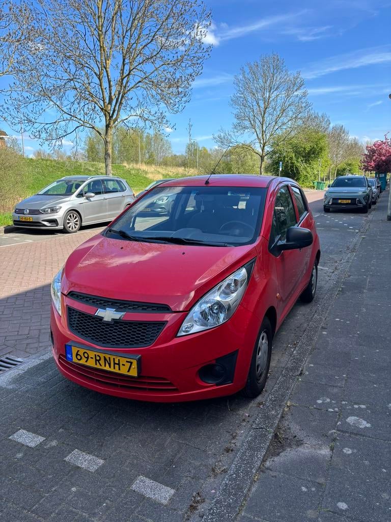 Chevrolet Spark 1.0 2011 Rood, Voorwielaandrijving, 839 kg, Stof, 4 cilinders