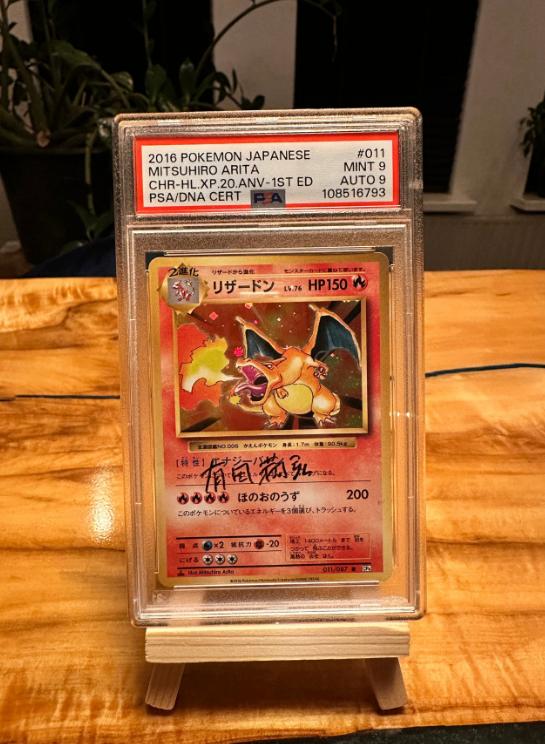1st edition Charizard met handtekening Arita PSA 9, Verzenden, Zo goed als nieuw, Losse kaart