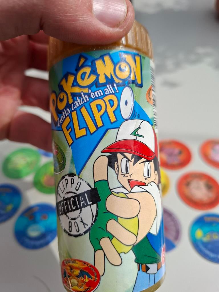Pokemon Flippo's (Smiths) met officiële bewaarkoker, Ophalen of Verzenden, Losse flippo's