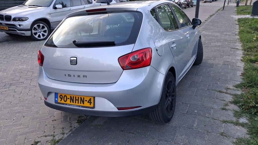 Zeer nette  en mooie Seat Ibiza1.2 44KW 2010 Grijs Airco Aux, Auto's, Voorwielaandrijving, Euro 5, Stof, 1198 cc