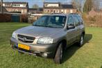 Mazda Tribute 3.0 V6 Touring AUT 4WD 2002 Bruin, Auto's, Mazda, Automaat, Bruin, Origineel Nederlands, Particulier