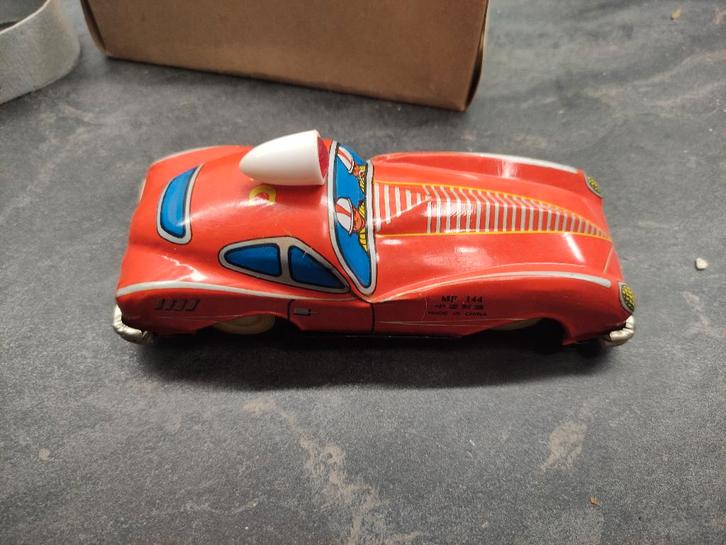 Blikken brandweerauto MF 144 Jaguar E type in doos!, Antiek en Kunst, Antiek | Speelgoed, Ophalen of Verzenden