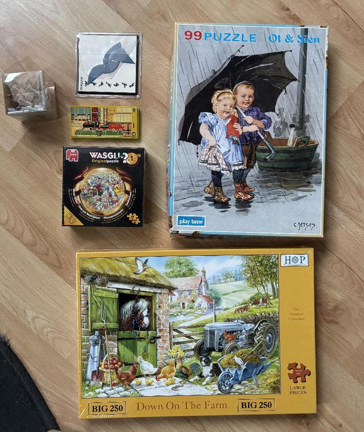 puzzels en spelletjes zie foto's teab, Kinderen en Baby's, Speelgoed | Kinderpuzzels, Zo goed als nieuw, Meer dan 50 stukjes, Ophalen of Verzenden