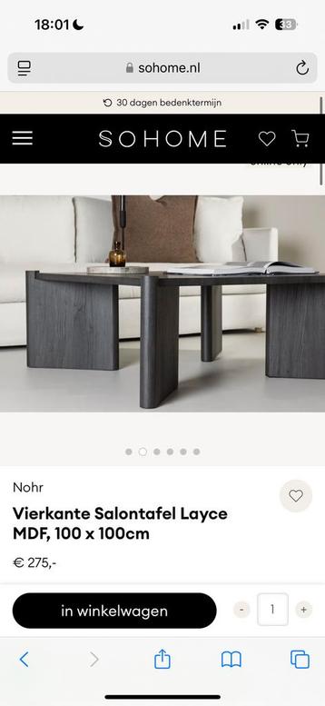 Zwarte salontafel beschikbaar voor biedingen