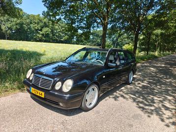 Mercedes-Benz E55 AMG 1999 zwart wit "oreo" interieur beschikbaar voor biedingen