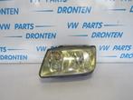 Koplamp links van een Volkswagen Bora, Verzenden, 3 maanden garantie, Gebruikt, Volkswagen