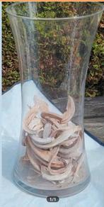 Grote glazen vaas met potpourri, Ophalen