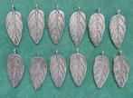 12 stuks Tibetan Silver Blaadjes charms 30 x 13 mm., Ophalen of Verzenden, Nieuw, Hanger