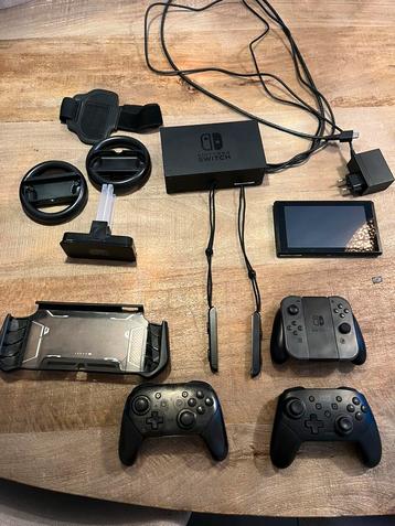 Nintendo Switch incl. 2 extra controllers en accessoires beschikbaar voor biedingen