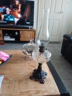 Antieke orginele olie lamp met gietijzeren  voet, Ophalen of Verzenden