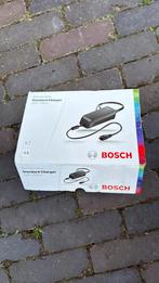 Bosch standard charger elektrische fiets, Ophalen, Nieuw, 50 km per accu of meer, Overige merken