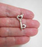 Zilveren vintage hanger van een sleutel nr.550