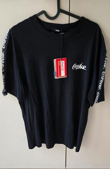 Exclusief BZB x Coca-Cola T-shirt  Maat M, Nieuw met kaartje beschikbaar voor biedingen