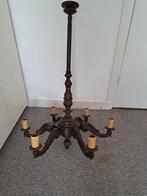 Antieke houten kroonluchter, Ophalen