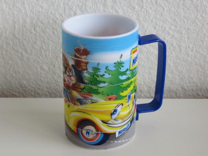 Nestlé Nesquik chocomel beker, mok puzzelbeker, Huis en Inrichting, Keuken | Servies, Gebruikt, Kop(pen) en/of Schotel(s), Overige stijlen
