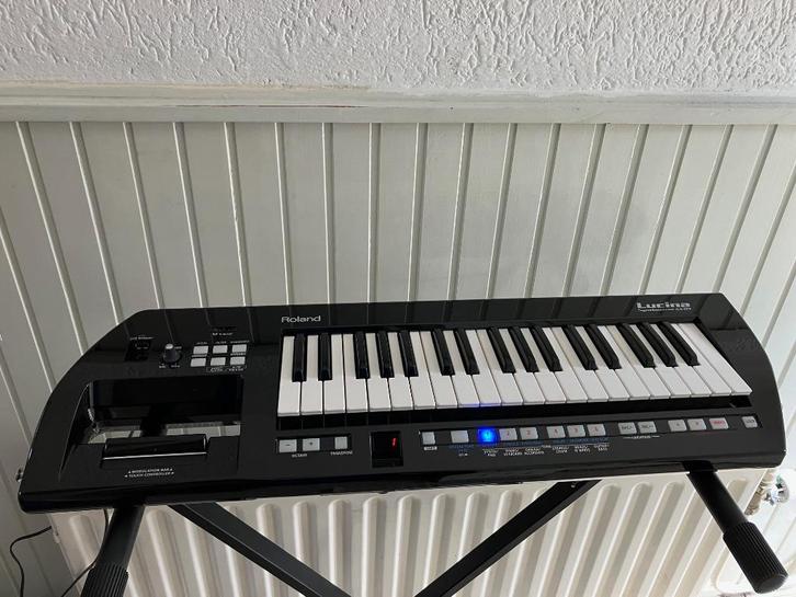 Roland Lucina AX-09 Black Sparkle Keytar zeldzame uitvoering, Muziek en Instrumenten, Keyboards, Zo goed als nieuw, Overige aantallen