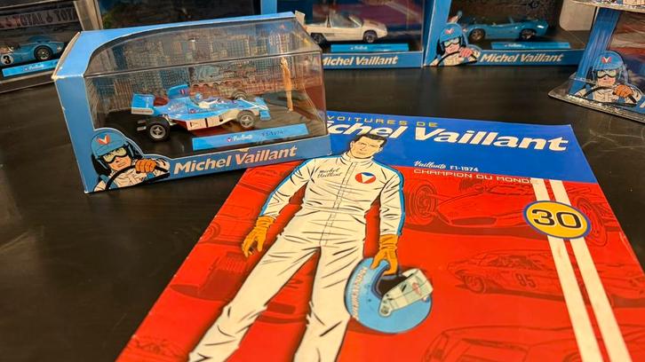 Nr30. Vaillante F1 1974 (+boekje) - Michel Vaillant, Hobby en Vrije tijd, Modelauto's | 1:43, Gebruikt, Auto, Overige merken, Ophalen of Verzenden