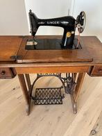 Singer machine in meubel, Ophalen