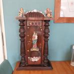 Oude klokkast met Mariabeeld, Ophalen