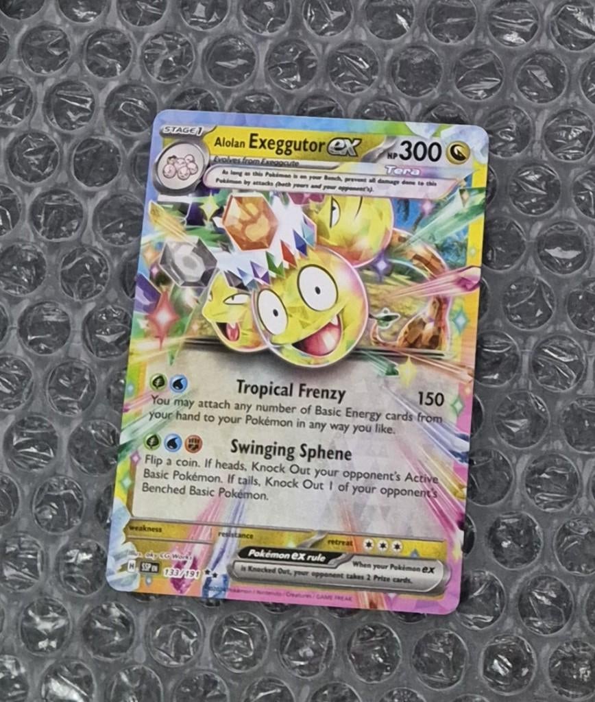 Alolan Exeggutor ex 133/191 Surging Sparks SSP Scarlet & Vio, Ophalen of Verzenden, Zo goed als nieuw, Losse kaart, Foil
