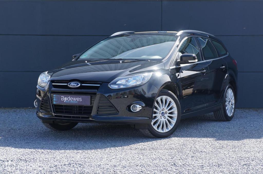 Ford Focus Wagon 1.6 TI-VCT Titanium met lage km stand, Auto's, Gebruikt, Zwart, 4 cilinders, Zwart