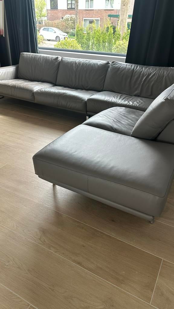 Grijze hoekbank van leer, Huis en Inrichting, Banken | Bankstellen, Gebruikt, 100 tot 125 cm, Hoekbank, 300 cm of meer