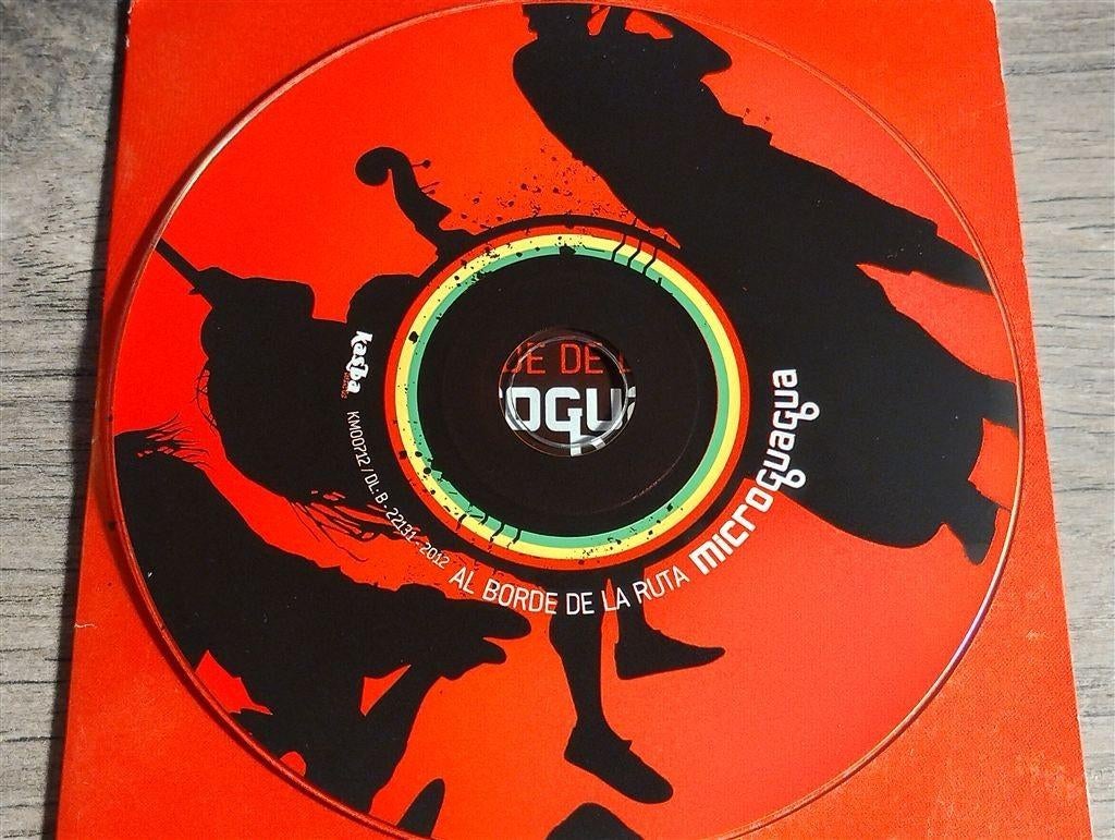Microguagua - Al Borde De La Ruta, Ophalen of Verzenden, Zo goed als nieuw