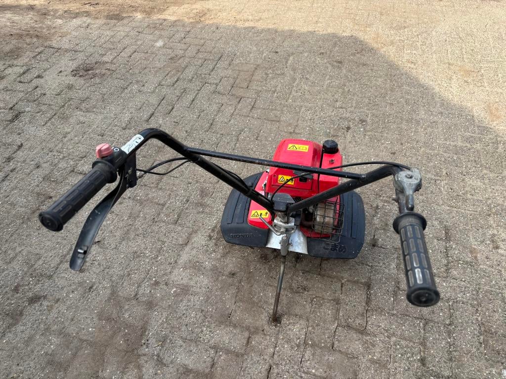 Dikke honda tuinfrees., Tuin en Terras, Hand-tuingereedschap, Ophalen, Zo goed als nieuw