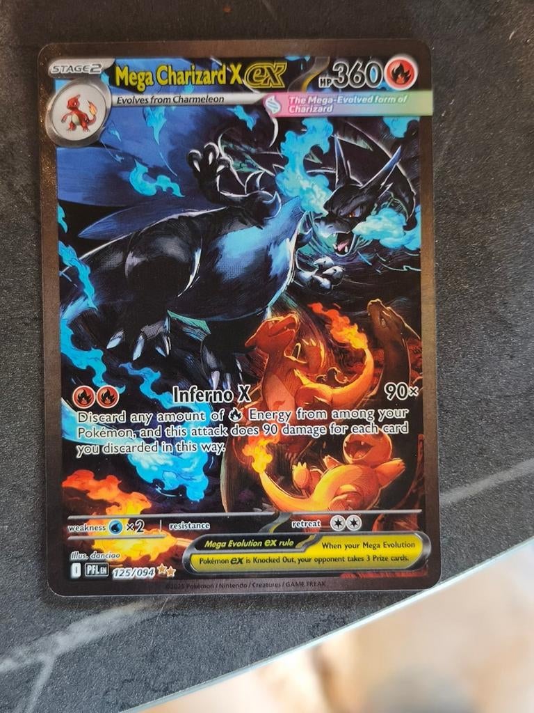 Mega Charizard ex 125, Ophalen of Verzenden, Zo goed als nieuw