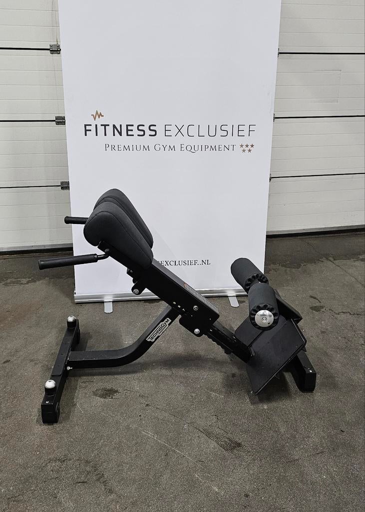 Technogym PureStrength Lower Back – Professionele Rugtrainer, Sport en Fitness, Fitnessmaterialen, Gebruikt, Overige typen, Armen