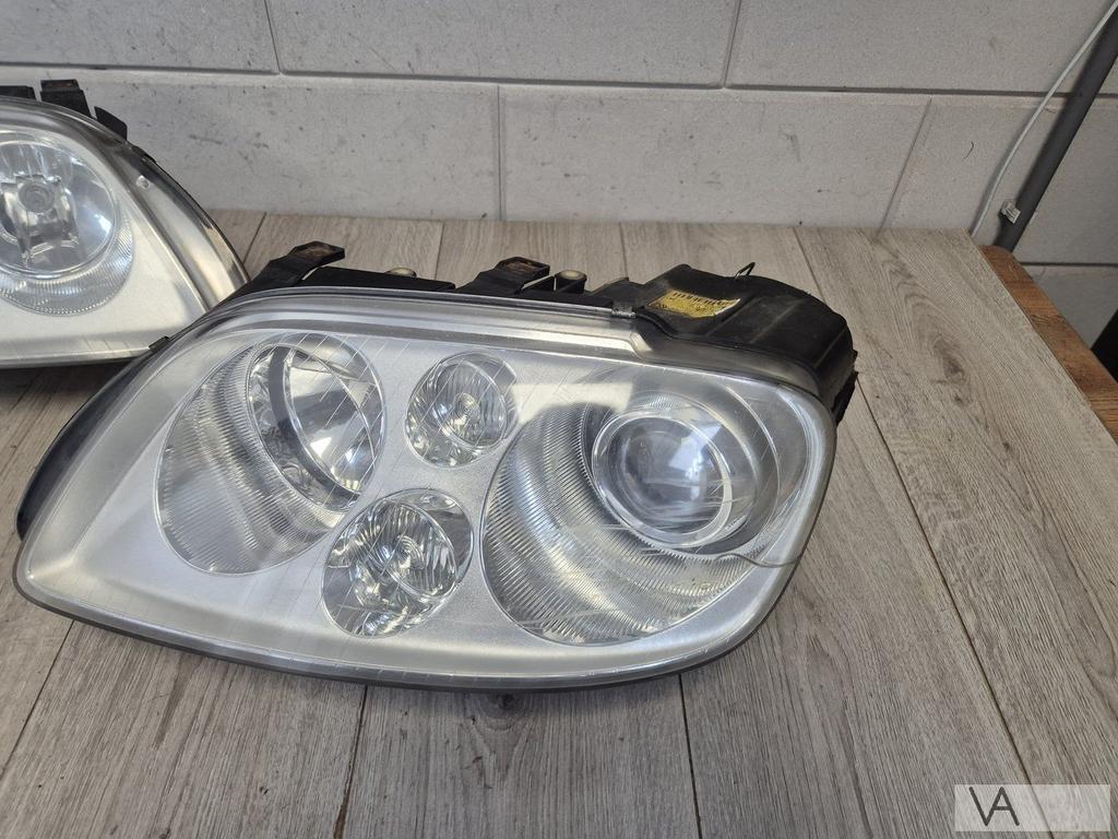 VW Touran 03-07 en Caddy 03-10 koplamp links xenon €100, Gebruikt, -, Volkswagen, -