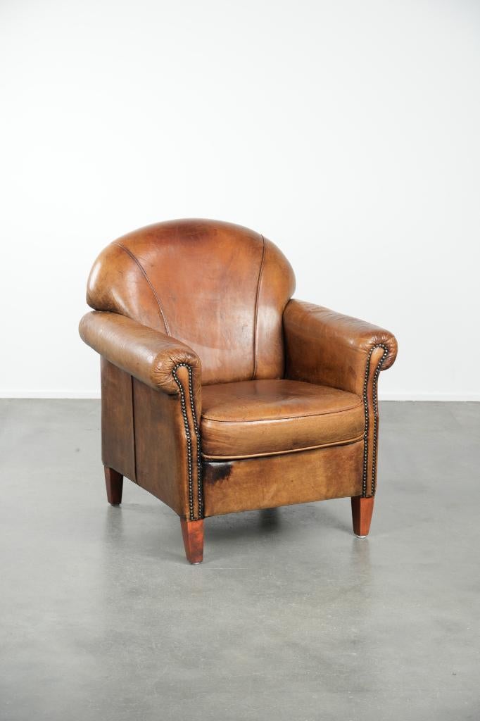 Karaktervolle schapenleren fauteuil met mooie vintage look, Huis en Inrichting, Fauteuils, Gebruikt, Leer, 75 tot 100 cm, 75 tot 100 cm
