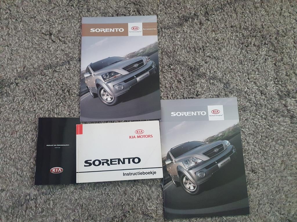 Kia Sorento instructieboekje en accessoire folders, Ophalen of Verzenden