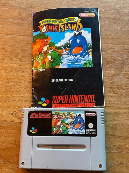 Snes yoshi’s island super mario world 2 spel cassette+boekje, Spelcomputers en Games, Games | Nintendo Super NES, Zo goed als nieuw