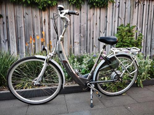 Goed functionerende damesfiets SPARTA., Fietsen en Brommers, Elektrische fietsen, Zo goed als nieuw, Sparta, 50 km per accu of meer