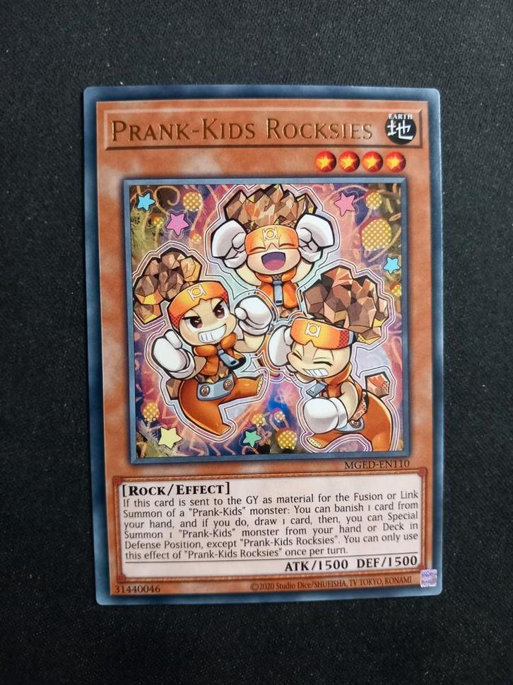 Maximum Gold: El Dorado Prank - Kids Rocksies 110 NM, Hobby en Vrije tijd, Verzamelkaartspellen | Yu-gi-Oh!, Zo goed als nieuw
