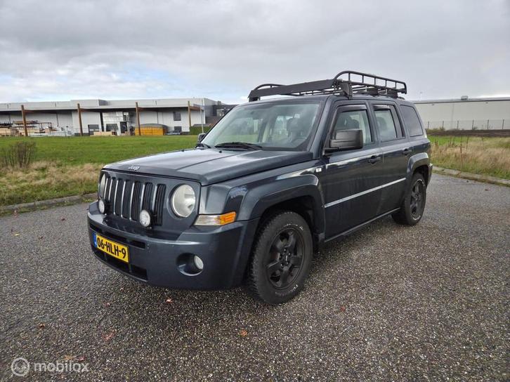 Jeep Patriot 2.4 Limited 4X4 / NIEUWE APK / AIRCO / TREKHAAK, Auto's, Jeep, Bedrijf, Te koop, Patriot, 4x4, ABS, Airbags, Airconditioning