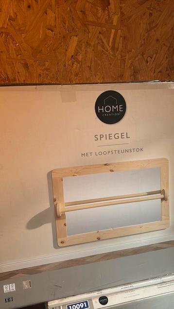 Spiegel met loopsteunstok beschikbaar voor biedingen