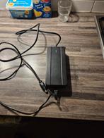 1 nieuwe goed werkende stella lader ., Fietsen en Brommers, Ophalen of Verzenden, Zo goed als nieuw, Overige merken