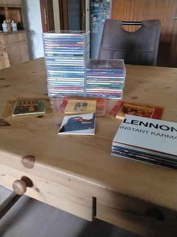 Een mooie verzameling single cd s o.a. Sting,Lennon, Guns N' beschikbaar voor biedingen