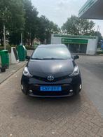 Toyota Prius 1.8 Hybrid 136pk Aut 2017 Zwart, Auto's, 4 cilinders, 7 stoelen, Zwart, 24 km/l