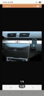 Afdekplaat vw autoradio rns 310 en 510, Ophalen